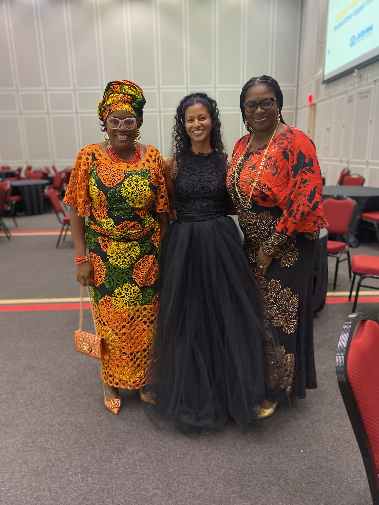 Three women in formal dress