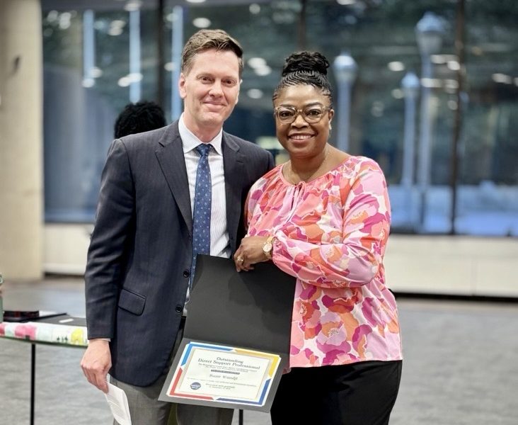 Executive Director Steve Keener and Suzie Wandji celebrate at the InterACC/DD award ceremony.